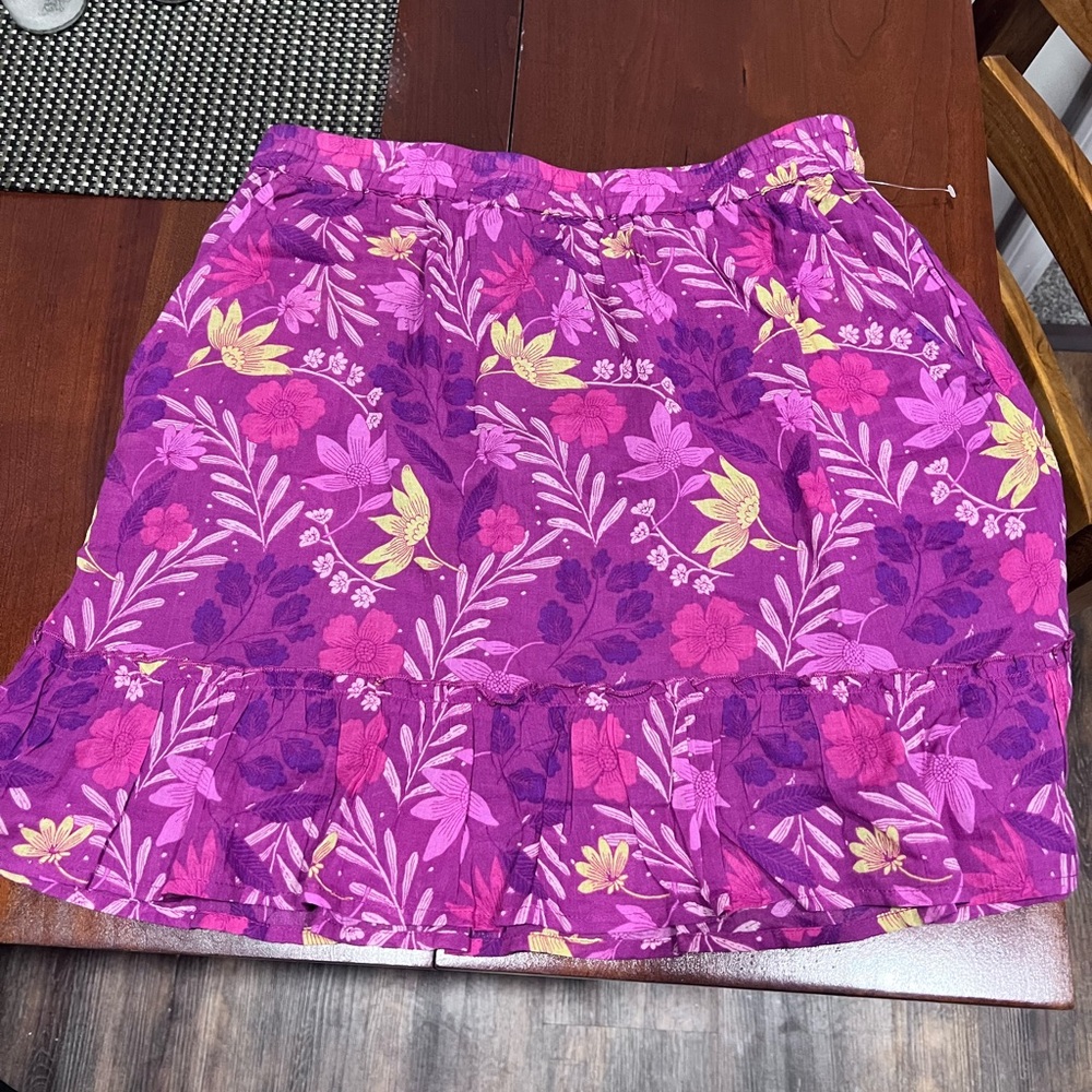 Knee length summer skirt with flirty ruffle hem.  Never worn